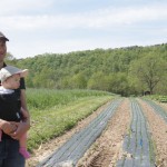 Tuscarora co-op Tim and Charlotte in the fields of Tuscarora co-op